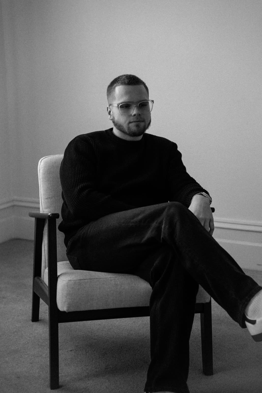 Blake Ryan seated in a chair